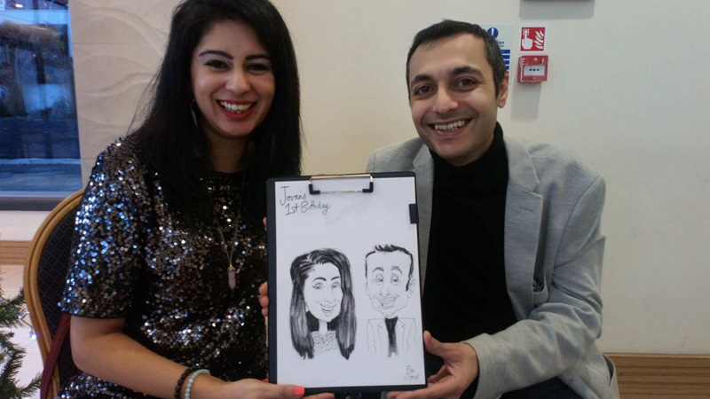 Caricature of a couple at a 1st birthday by caricaturist for hire pen jones